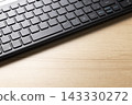Computer keyboard placed on the desk 143330272
