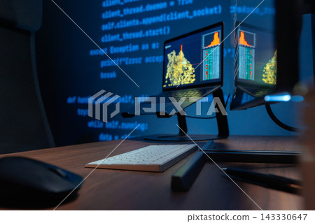 Dark Developer Workspace With Laptop And Monitor Dark Developer Workspace With Laptop And Monitor 143330647