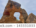 Ancient arcosolium tombs carved into the rock of the Valley of the Temples in Agrigento. 143331033