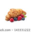Croissant with raspberries and blueberries on white backgrounds 143331222