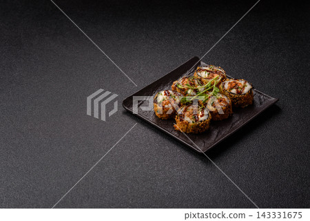 Hot tempura sushi rolls with tuna, rice, soy sauce, wasabi, and ginger. Hot tuna tempura roll 143331675