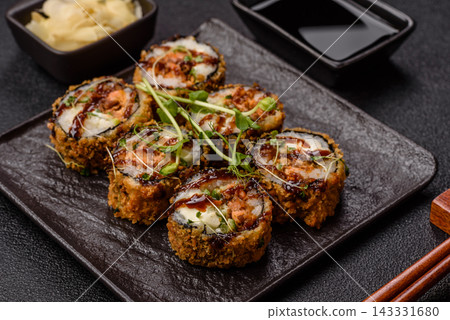 Hot tempura sushi rolls with tuna, rice, soy sauce, wasabi, and ginger. Hot tuna tempura roll Hot tempura sushi rolls with tuna, rice, soy sauce, wasabi, and ginger. Hot tuna tempura roll 143331680