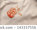 red tomato ketchup stain on khaki fabric. Laundry stain removal concept. 143337556