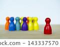 Colorful figures positioned together representing diversity, equal opportunity, inclusion, and collaborative leadership 143337570