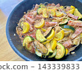 Zucchini and bacon tomato pasta 143339833