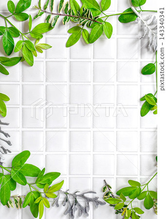 Green leaf and white tile full-frame background Green leaf and white tile full-frame background 143340341