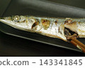 Grilled saury, with its flesh flaked apart with chopsticks, a taste of autumn enjoyed on a Japanese dinner table. 143341845
