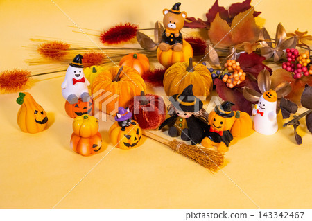 A collection of cute ghosts - Halloween-themed background A collection of cute ghosts - Halloween-themed background 143342467