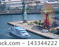 Kobe: The Ferris wheel and cruise ships as seen from Kobe Port Tower (Harborland) (late summer) 143344222