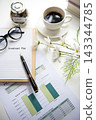 Invest planning for retirement planning with saving jar and financial graph document. 143344785