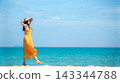 Summer vacations. Lifestyle woman relax and chill on beach background. 143344788