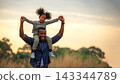 Happy African family child daughter riding the neck father and running  143344789
