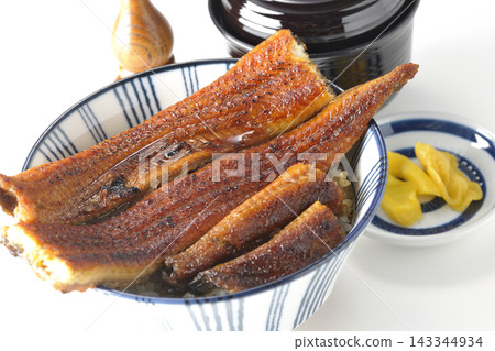 Unadon (eel rice bowl), soup, and pickles 143344934