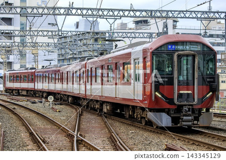 Kintetsu 8A series train running near Kyoto Station 143345129