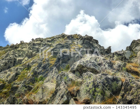 Todorka Pirin Mountains Bulgaria rugged granite rocks boulders and alpine hiking trail near Bansko Todorka Pirin Mountains Bulgaria rugged granite rocks boulders and alpine hiking trail near Bansko 143345495