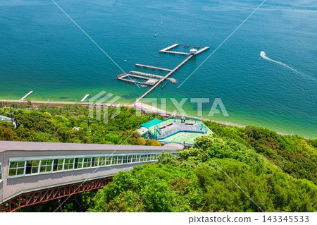 A view of the ropeway's mountaintop station and sea fishing park from Mt. Hachibuse in Suma Ward, Kobe City. A view of the ropeway's mountaintop station and sea fishing park from Mt. Hachibuse in Suma Ward, Kobe City. 143345533