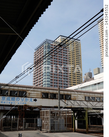 High-rise apartment buildings in front of the station as seen from JR Nippori Station High-rise apartment buildings in front of the station as seen from JR Nippori Station 143345552