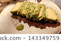 Matcha salt and tempura close-up 143349759