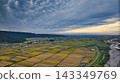 A scene from the Kurobe River alluvial fan in Toyama Prefecture during the rice harvest season. 143349769