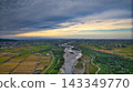 A scene from the Kurobe River alluvial fan in Toyama Prefecture during the rice harvest season. 143349770