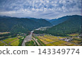 A scene from the Kurobe River alluvial fan in Toyama Prefecture during the rice harvest season. 143349774