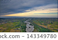 A scene from the Kurobe River alluvial fan in Toyama Prefecture during the rice harvest season. 143349780