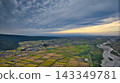 A scene from the Kurobe River alluvial fan in Toyama Prefecture during the rice harvest season. 143349781