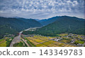 A scene from the Kurobe River alluvial fan in Toyama Prefecture during the rice harvest season. 143349783