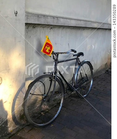 Bicycle stopped on the street Bicycle stopped on the street 143350289