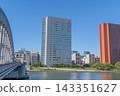 Exterior view of Nichirei Foods headquarters, Kachidoki Bridge, and Sumida River [Tsukiji, Chuo Ward, Tokyo] 143351627