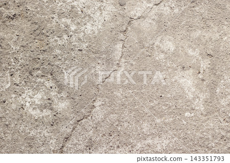 Close up view of a light gray weathered concrete floor showing a vertical hairline crack, fine grain texture, and subtle white dust marks ideal for design work. High Quality Photo Close up view of a light gray weathered concrete floor showing a vertical hairline crack, fine grain texture, and subtle white dust marks ideal for design work. High Quality Photo 143351793