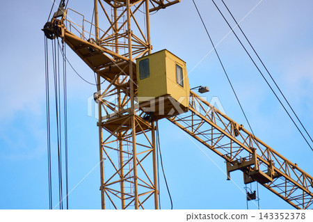 Detailed view of industrial crane trusses and pulley system 143352378
