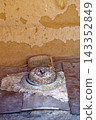 Traditional Stone Hand Quern Mill with Grain Sieve Inside Berber Mud Brick Dwelling 143352849