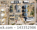 Construction site of a modern agricultural complex with silos, grain elevator and storage terminal. Aerial view 143352986