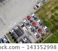 Aerial view of a large fleet of new commercial trucks at a dealership 143352998