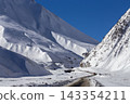 Winter Mountain Road Along the Snowy Georgian Military Highway in Caucasus 143354211