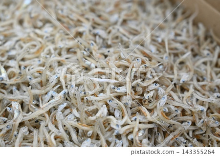 Macro Pile of Dried Anchovies for Traditional Asian Cuisine Macro Pile of Dried Anchovies for Traditional Asian Cuisine 143355264