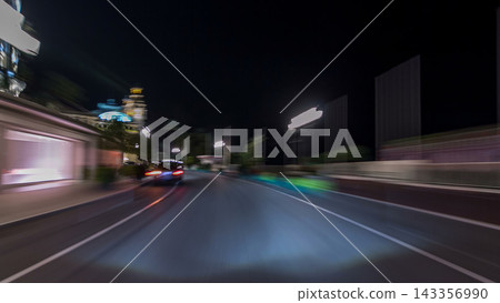 Monaco city roads traffic at night with car light trails timelapse hyperlapse drivelapse Monaco city roads traffic at night with car light trails timelapse hyperlapse drivelapse 143356990
