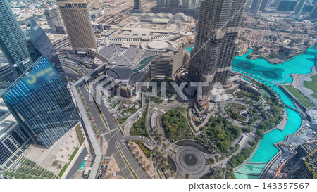 Dubai downtown street with busy traffic and skyscrapers around timelapse. Dubai downtown street with busy traffic and skyscrapers around timelapse. 143357567