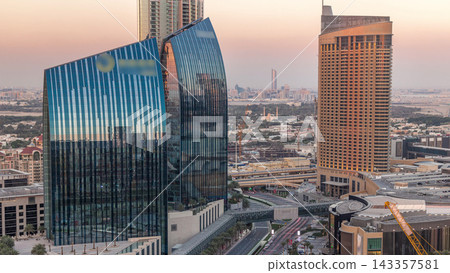 Dubai downtown street with busy traffic and skyscrapers around timelapse. Dubai downtown street with busy traffic and skyscrapers around timelapse. 143357581