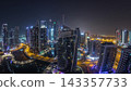 Aerial view of Dubai Marina residential and office skyscrapers with waterfront night timelapse 143357733