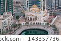 Modern residential architecture of Dubai Marina and Mohammed Bin Ahmed Almulla Mosque aerial night to day timelapse 143357736