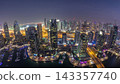 Aerial top view of Dubai Marina day to night timelapse. Modern towers and traffic on the road 143357740