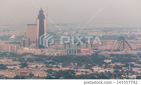 Aerial view of neighborhood Deira and Dubai creek with typical old and modern buildings timelapse. Aerial view of neighborhood Deira and Dubai creek with typical old and modern buildings timelapse. 143357742