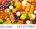 Healthy Halloween fun food mix: cheese ghosts and mummies, banana ghosts and green apples, blueberries and blackberries. Party spooky snacks for kids 143357869