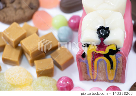 Tooth decay and sweets Tooth decay and sweets 143358263