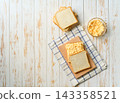 Homemade egg sandwich for breakfast on a white table,  top view. 143358521