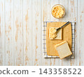 egg salad sandwiches , top view. freshly made egg salad sandwiches on a white table,copy space for text. 143358522