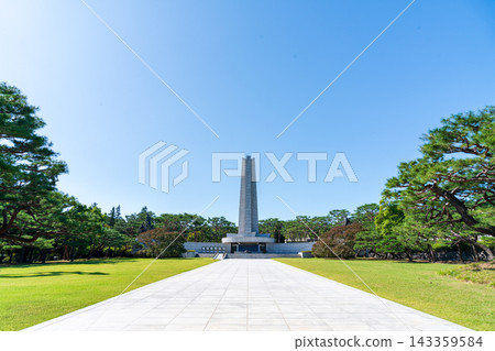 Hyeonchungtap Memorial Tower and Surrounding Nature at Seoul National Cemetery on a Clear Autumn Day, South Korea Hyeonchungtap Memorial Tower and Surrounding Nature at Seoul National Cemetery on a Clear Autumn Day, South Korea 143359584