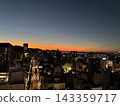 Takamatsu city bathed in the sunset, with a view towards Takamatsu Port. 143359717